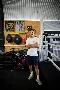 John at Deptford Boxing Club posing in front of equipment next to the boxing ring