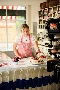 Behind the scenes of a baker at N5 Cafe in London placing a strawberry on a cake for Xero Love Changes Everything campaign