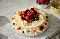 Close up of freshly decorated cake with berries and buttercream icing at the N5 Cafe in Finsbury Park for  Xero Love Changes Everything campaign